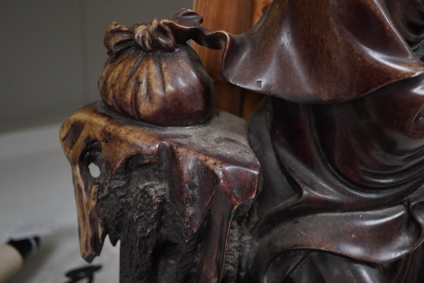 A large Chinese soapstone figure of an elder, 50cm high